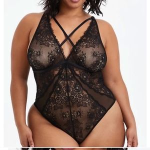 Strappy plunge torrid bodysuit in black lace
